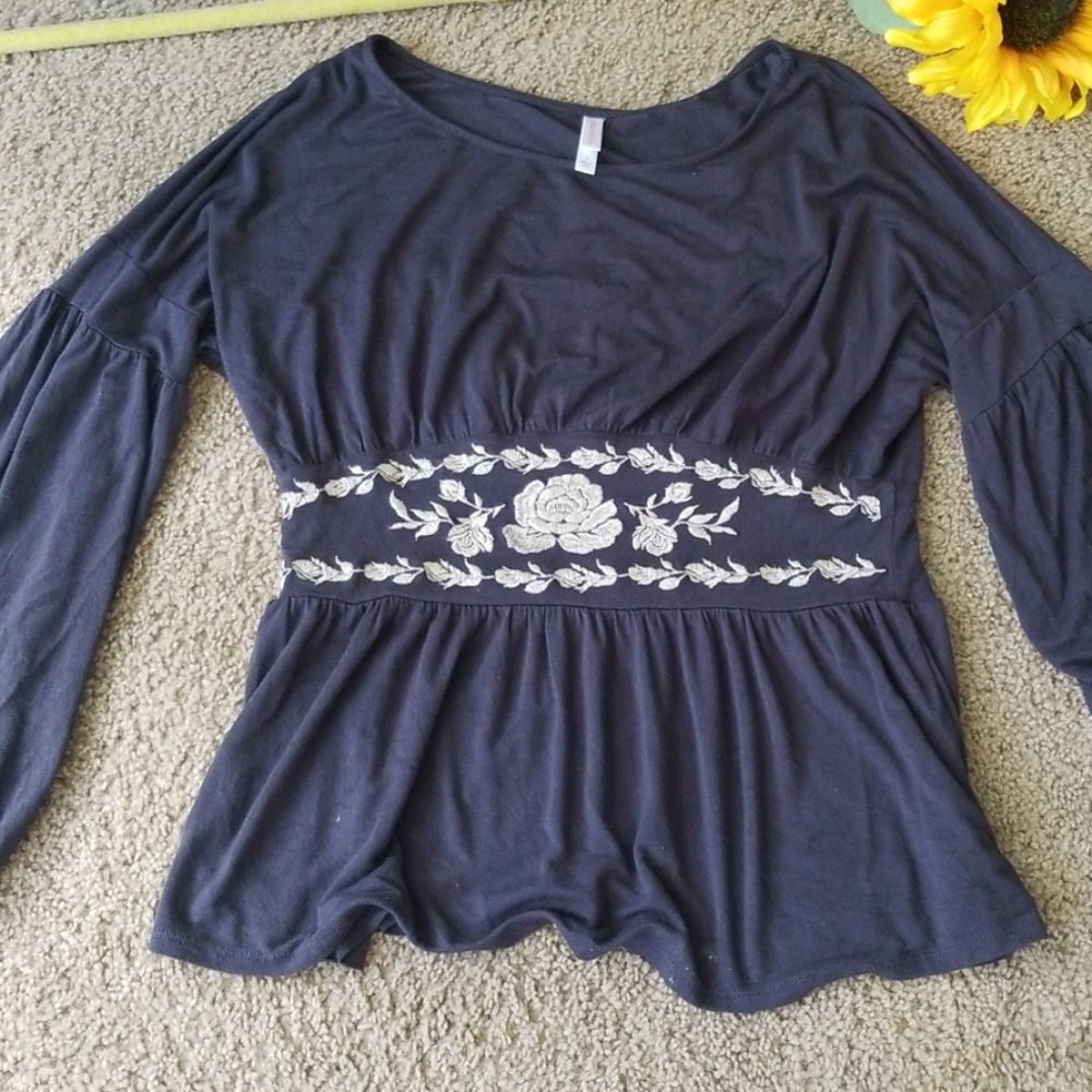 Shirt with sling sleeves